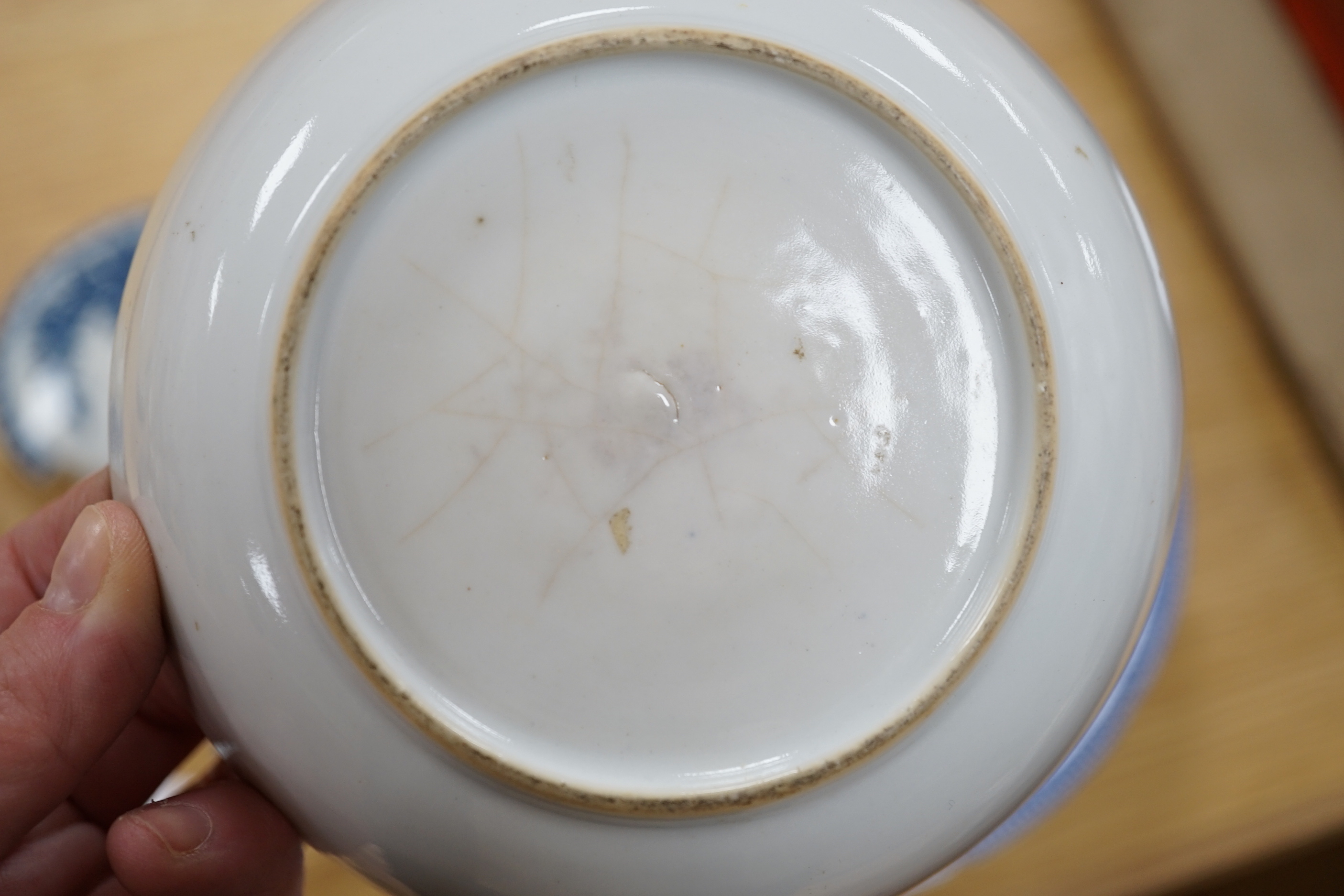 A 19th century Abbotsford pattern blue and white tureen and cover, various dishes and a collection of early Worcester tea and coffee pot covers